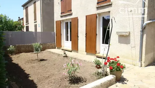 A vendre une maison de 103 m² avec jardin et garage 