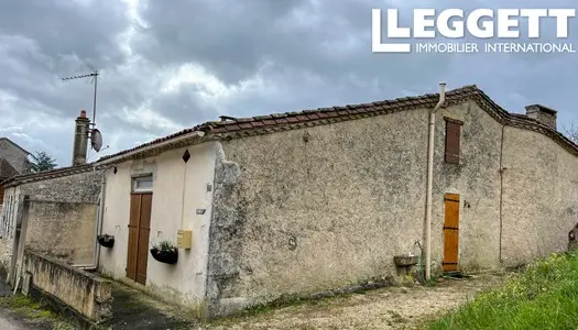 Petite maison avec grand jardin au coeur du village