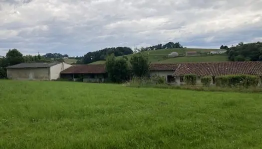 TERRAIN AVEC BATIMENT AGRICOLE ET CHANGEMENT DE DE 