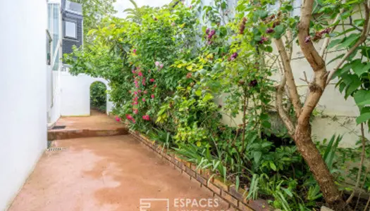 Maison avec jardin et plateau de 100m2 en rez de jardin 