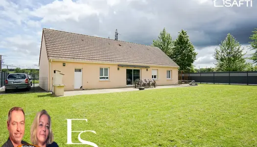 Agréable et fonctionnel pavillon de plain-pieds de 6 pièces avec garage. 