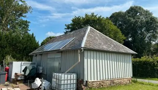 Bâtiment de stockage à louer + terrain en cailloux 