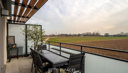 Appartement contemporain avec terrasse et vue dégagée