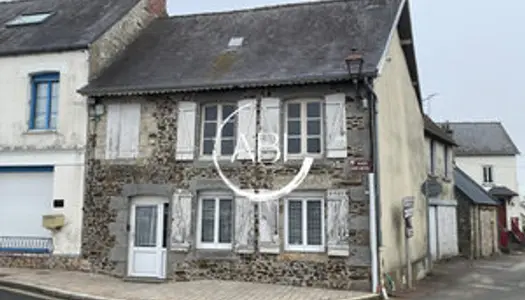 Dans le bourg, maison à rénover avec garage de 43 m²