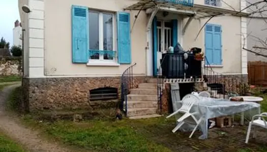 Appartement F2 avec jardin, 2 places de stationnement et cave voutée