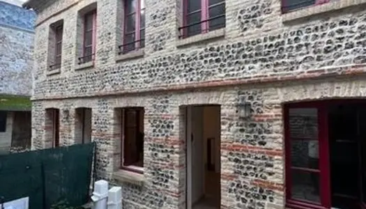 Maison tout confort avec jardin en plein coeur de ville 