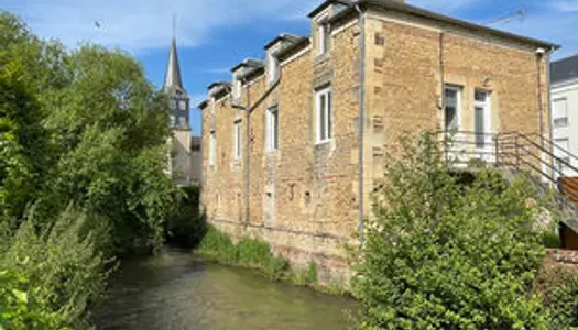 Mézidon Vallée d'Auge, immeuble de quatre logements. 