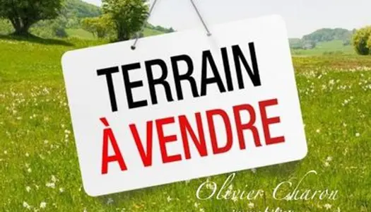 Vends terrain à bâtir