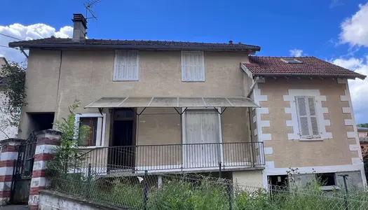 Maison à rénover avec jardin et garage 