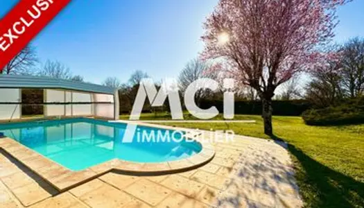 Exclusivité Mci Immobilier Villa sur grand terrain arboré avec sous-sol 