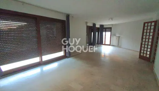 Appartement 110m² avec balcon, garage et cave