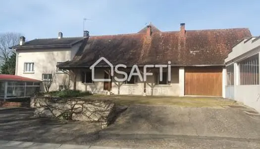 Ensemble immobilier de deux maisons et deux garages