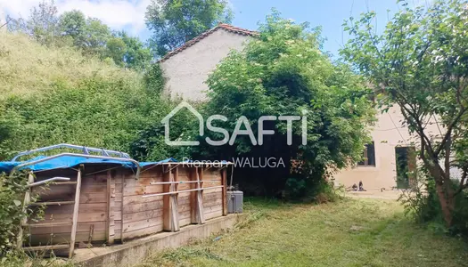 Séduisante maison dans un cadre verdoyant 