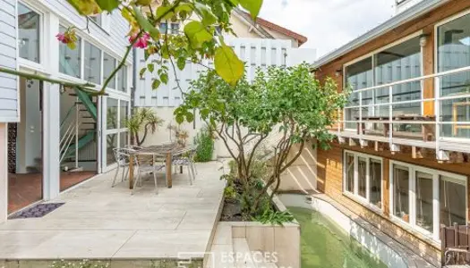 Maison familiale bardage bois et son annexe à Issy-les-Moulineaux 