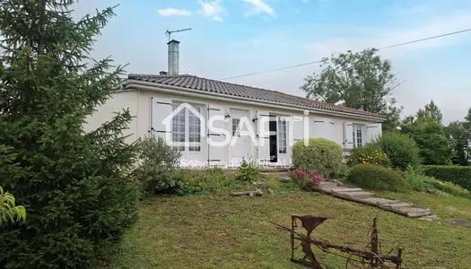 Maison avec véranda, terrasse et pergola bio-climatique 