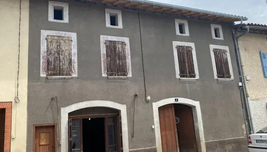 Maison à restaurer disposant d'un jardin et garage 