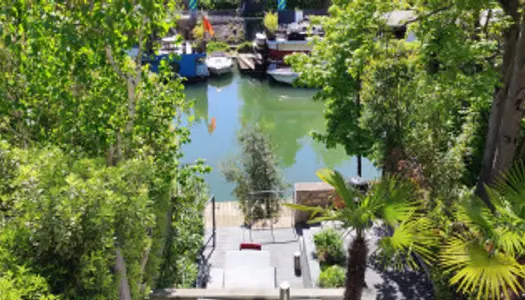 VIVRE AU BORD DE L'EAU A PARIS 