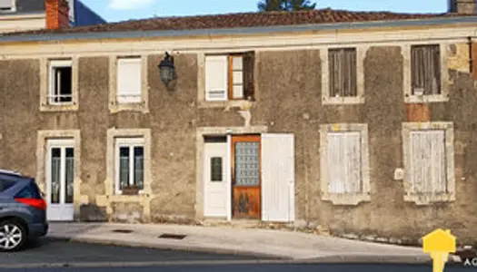 Bien immobilier composé de 2 maisons communiquante (dont une