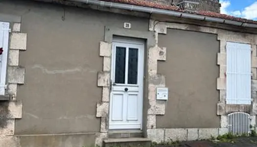 Petite maison de 50 m² avec cour et garage 