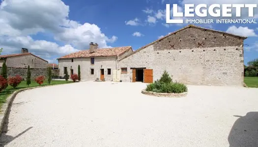 Maison de campagne idyllique avec un hectare de terrain et une grande grange.